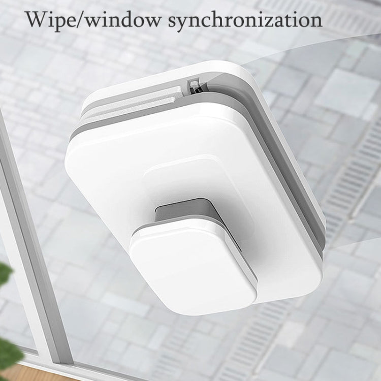 Double-sided magnetic window wiper with rectangular head and squeegee edge, angled view