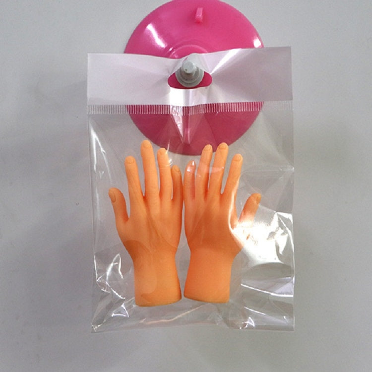 Orange pet massage finger cots, pair shown in clear packaging