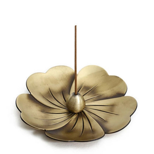 Flower-shaped bronze incense burner with central cone and raised petals