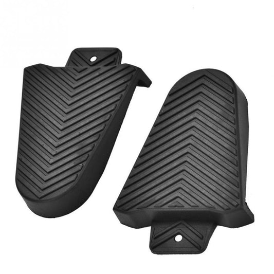Black textured shoe cleat pads with mounting hole, pair