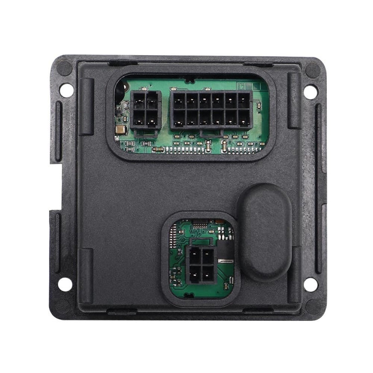 AFS headlight turning control module, black housing with green circuit board and connector ports