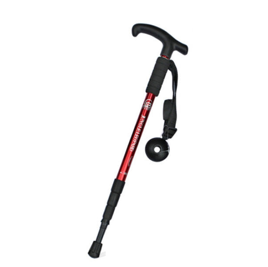 Red trekking pole with curved T-handle, foam grip, and wrist strap