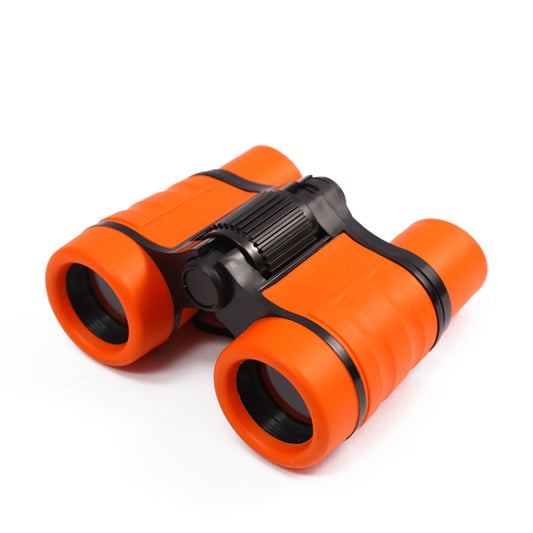 Pair of orange children's binoculars with dual eyepieces and center focus wheel