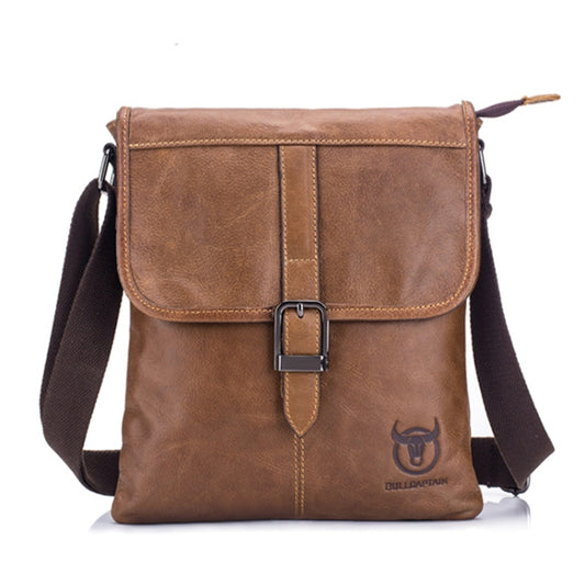 Men's brown leather shoulder bag with front flap, metal buckle, and adjustable crossbody strap.