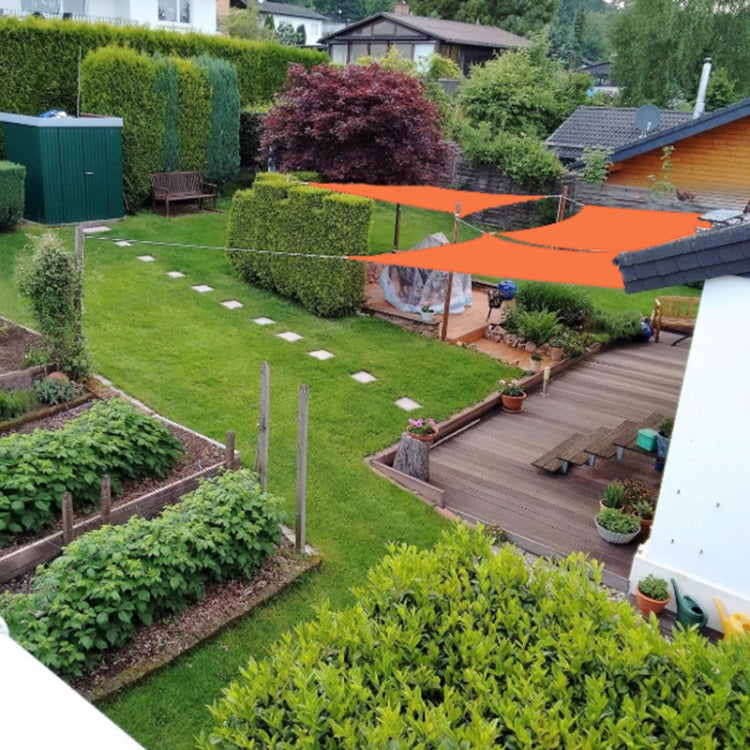 Orange waterproof anti-UV sunshade sail canopy over garden patio