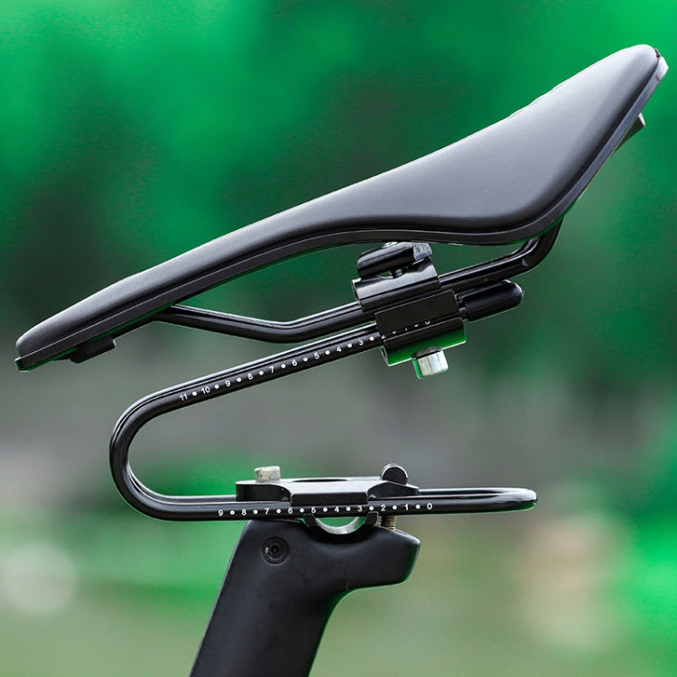 Gray bicycle seat with bow shock absorber rails and adjustable clamp