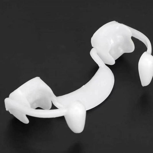 Retractable white vampire teeth accessory with curved fangs, set of removable pieces
