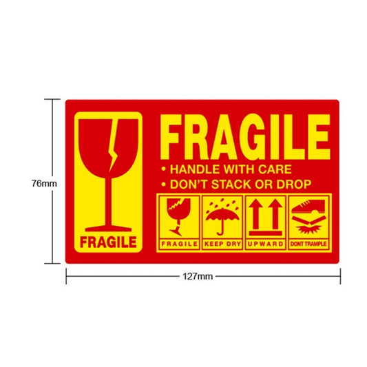 Fragile warning sticker, red/yellow label with FRAGILE text; 127 x 76 mm