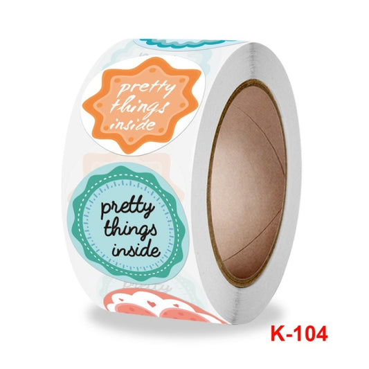 Decorative sealing sticker roll featuring round "pretty things inside" label designs