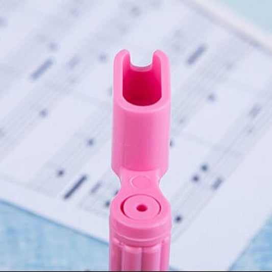 Pink ABS guitar string pulling cone with U-shaped opening and grip base