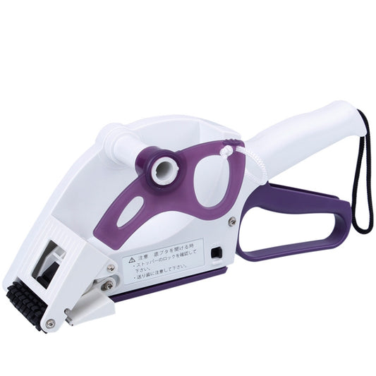 Handheld label labeller with purple frame, white handle, and label roll inside tray