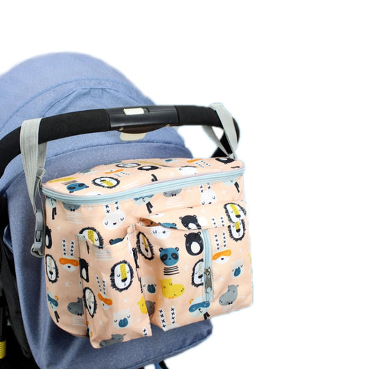 Multifunctional stroller storage bag with light beige penguin animal print, zip pockets.