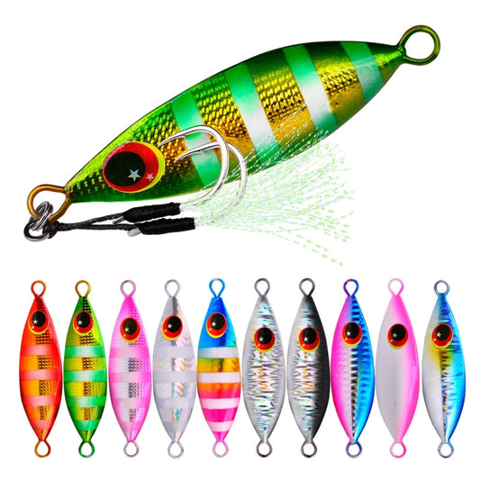 Metal sea fishing lure, green and gold striped body with red eye and treble hook