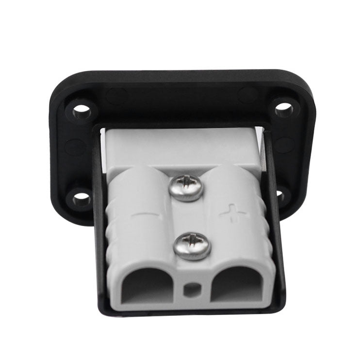 White dual terminal block insert inside black connector socket frame