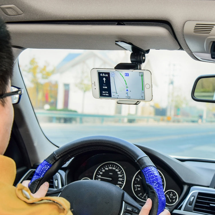 Black visor-mounted phone holder holding a smartphone in the cradle