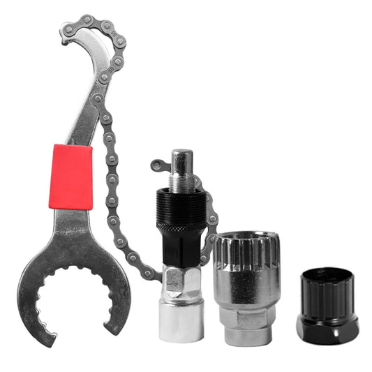 Bicycle cassette tool set with chain whip, red pad handle, and metal adapters