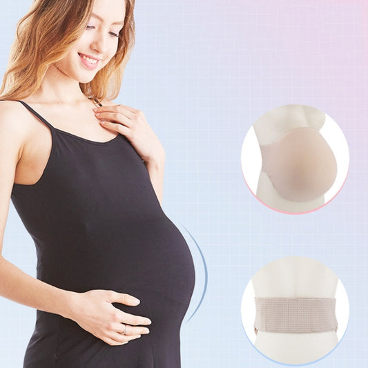 Beige fake pregnancy belly foam worn under a black tank top, front view