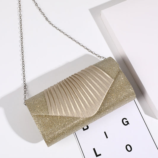 Gold pleated crossbody evening bag with chain strap