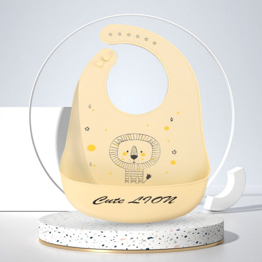 Yellow silicone baby bib with lion illustration and “Cute Lion” text
