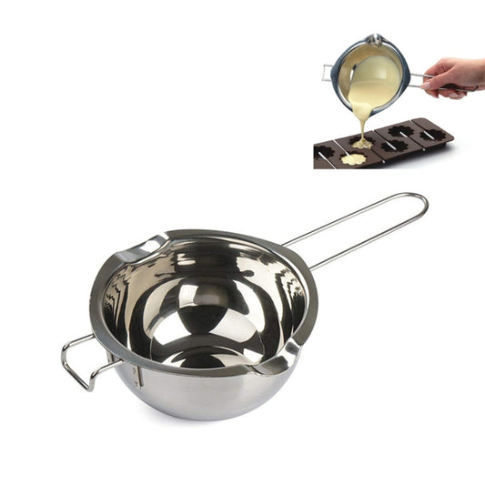 Stainless steel chocolate melting pot with long handle, side arms, and drip spout pouring from ladle
