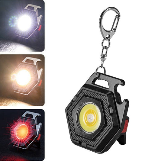 Mini keychain LED flashlight, black housing with bright yellow COB light and metal carabiner
