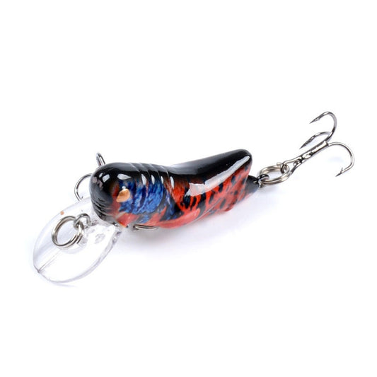 Hard plastic fishing lure with black, blue, and orange painted body, clear lip, treble hooks