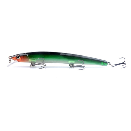 Green minnow-style fishing lure with two treble hooks, dark stripe body, and metal split rings.