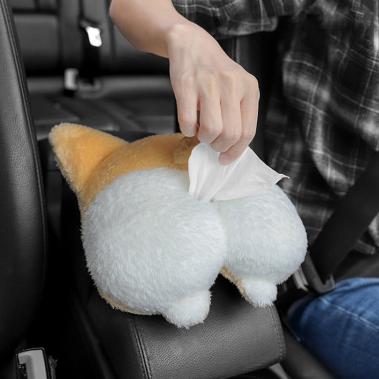 Corgi plush tissue box cover on car seat with tissue being pulled by hand