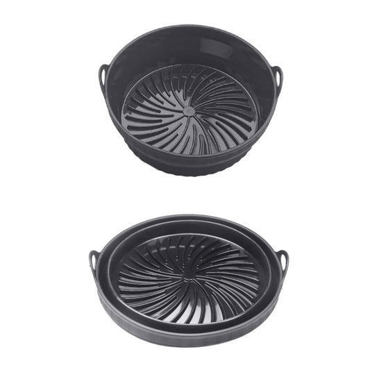 Black round silicone air fryer grill mat with raised grill pattern and side handles.