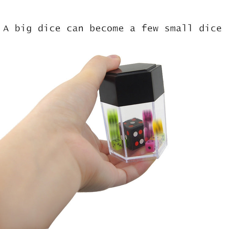 Hand holding black-lidded dice prop box with multicolor dice inside