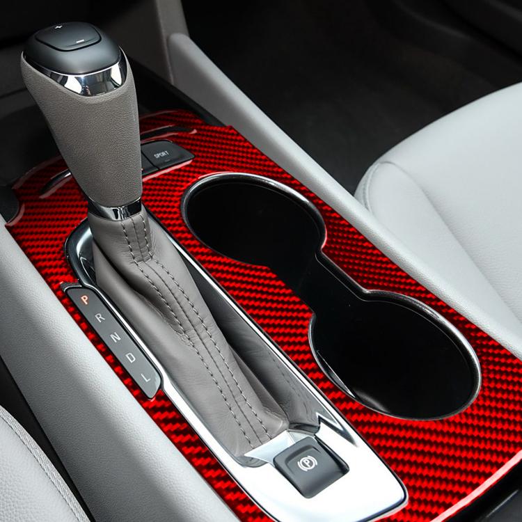Red carbon-fiber gear panel sticker installed on center console around shifter and cup holders