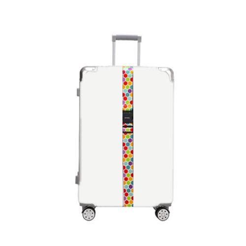 Luggage anti-mis-opening packing strap with multicolor dotted pattern, secured across suitcase