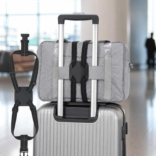 Gray travel luggage with black elastic binding straps and buckle tabs on end.