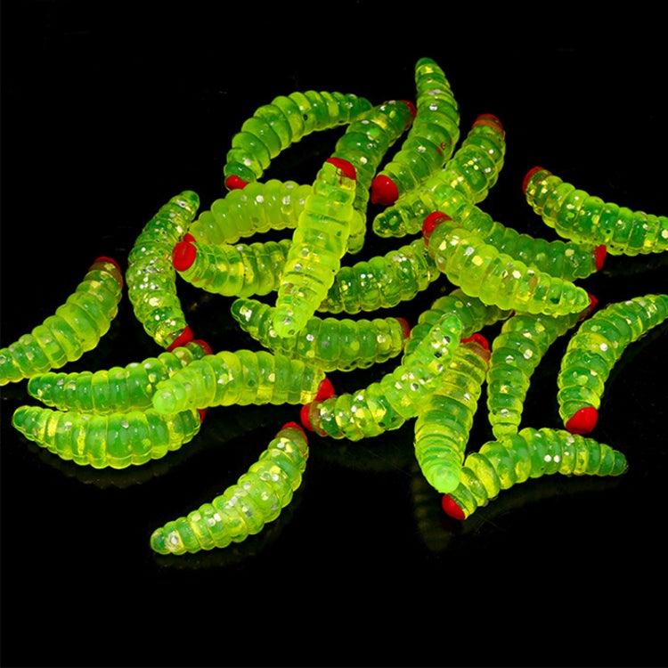 Green plastic worm grubs with red-tipped beads, fake fishing bait