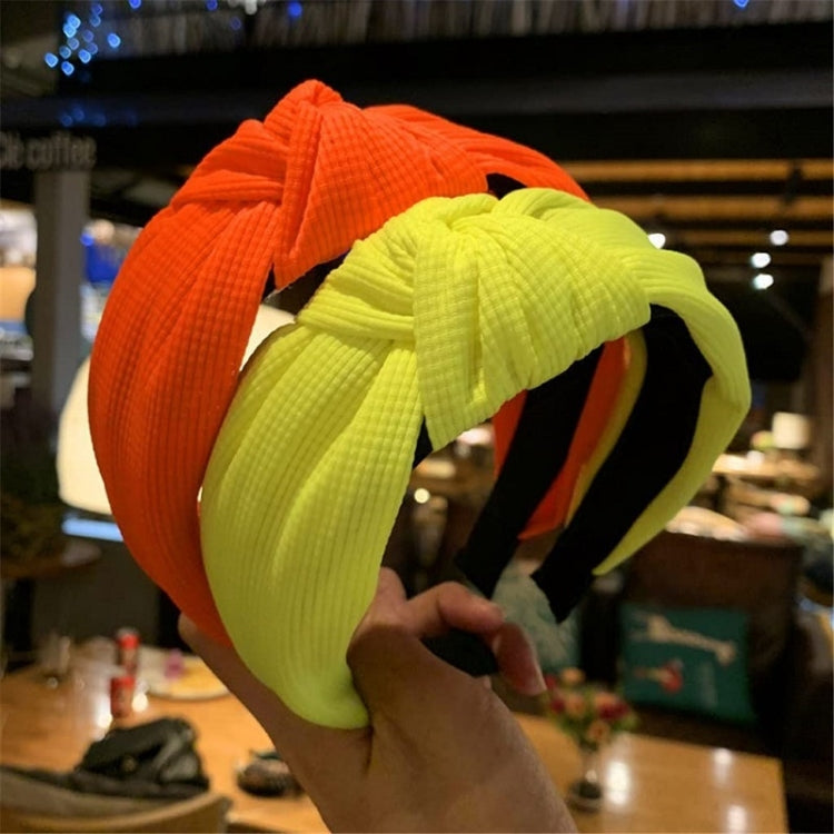 Pressed fabric headbands, orange and neon yellow-green with knotted wide bands