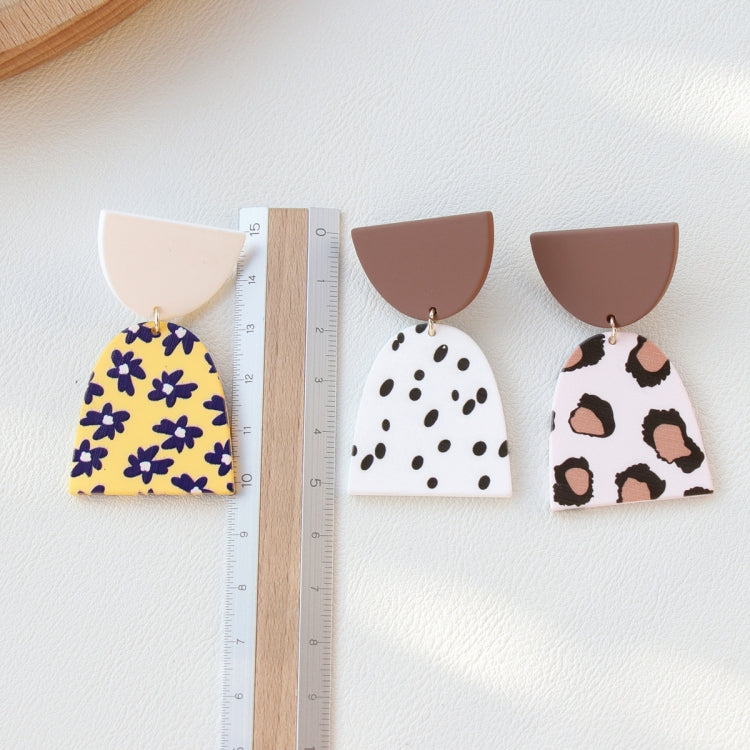 Acrylic clay dangle earrings with floral, polka-dot, and leopard-pattern teardrops