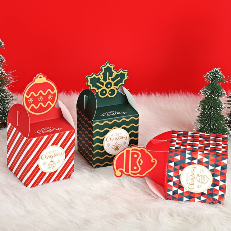 Three Christmas candy gift boxes in red and green patterns with ornament topper cutouts