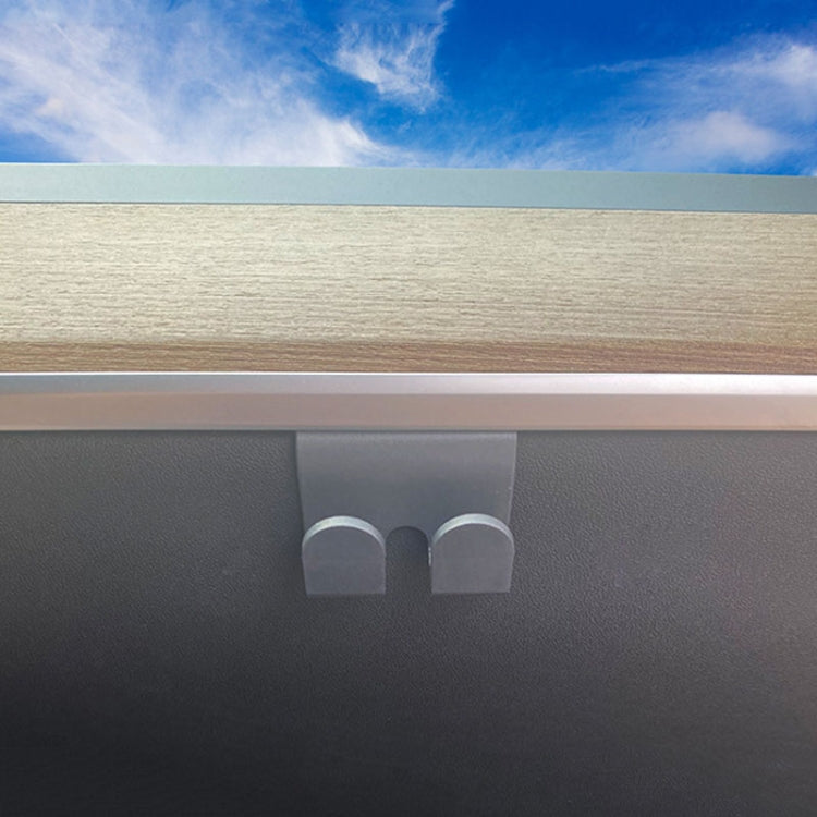 Two gray glove box hook prongs mounted under dashboard trim