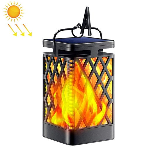 Outdoor solar lantern light with diamond-cut sides and glowing flame effect