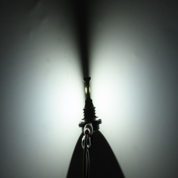 H11B LED car headlight bulb with metal base, emitting white light beam