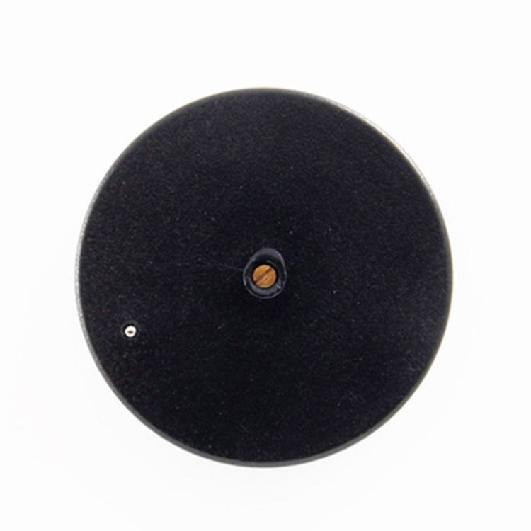 Round black plastic thermometer back with central mounting hole