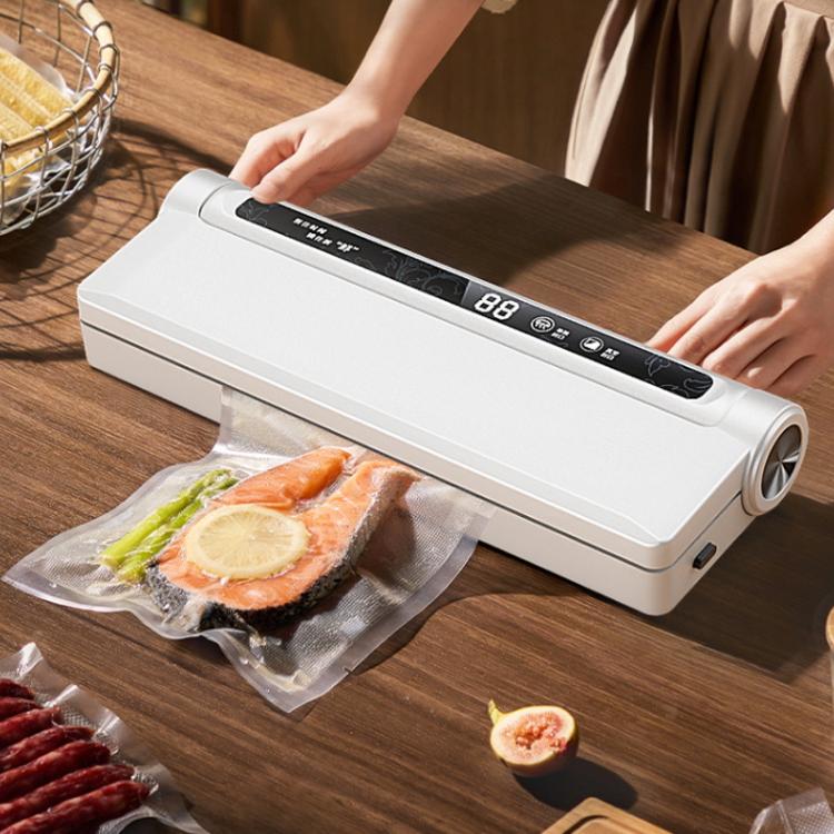 White countertop vacuum packaging sealing machine with control display and sealing bar