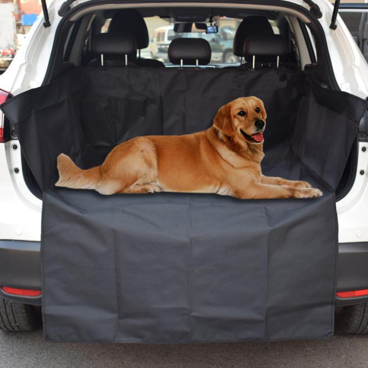 Black SUV trunk pet mat with raised edges, supporting a resting dog