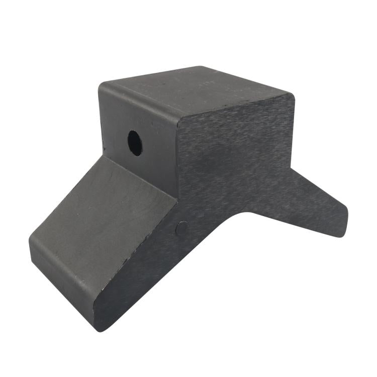Gray V-shaped kayak trailer bow support block with mounting holes on the top and face.