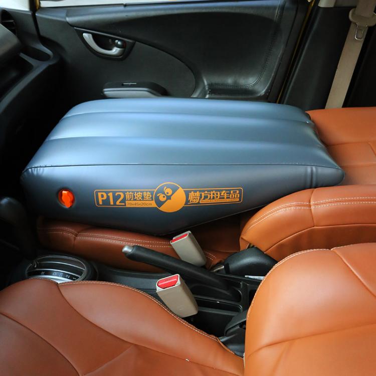 P12 car passenger inflatable bed fitted on seat in car interior