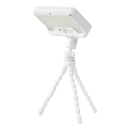 White solar motion sensor outdoor light with octopus-style tripod legs