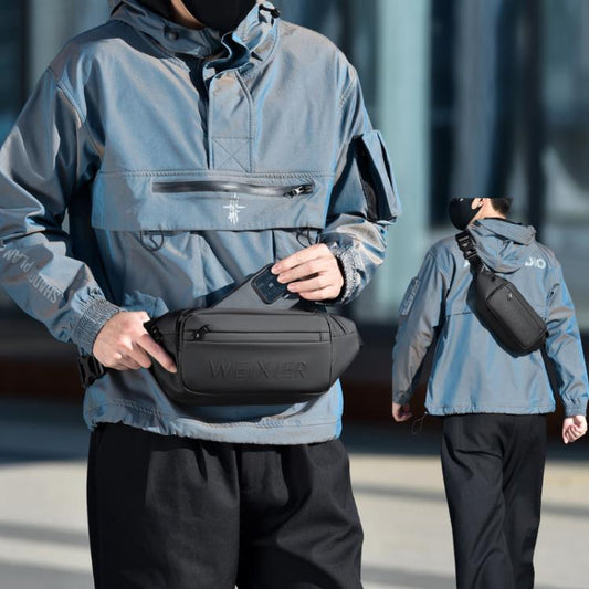 Waterproof sling bag worn across chest with zip front pocket by a person