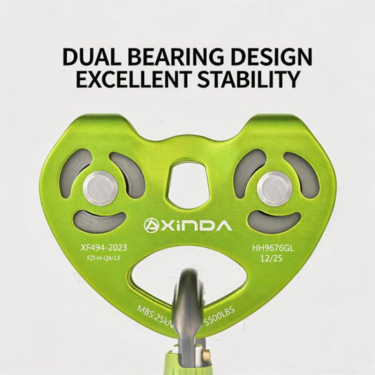 Green heart-shaped dual-bearing pulley with two rollers and center opening
