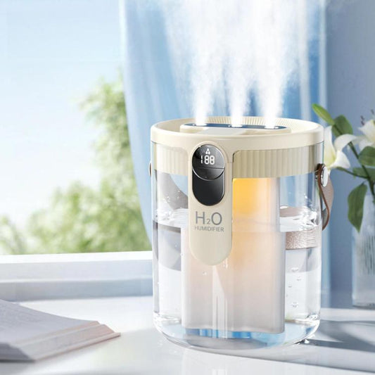 Beige 1.5L cool mist humidifier with top control panel and circular mist outlet