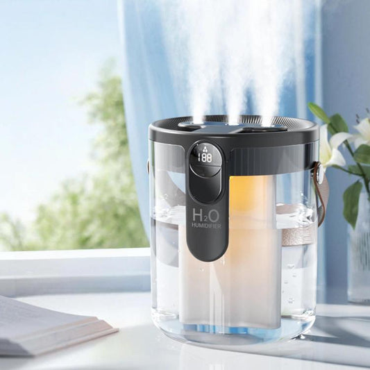 Grey 1.5L cool mist humidifier with top control panel and circular mist outlet